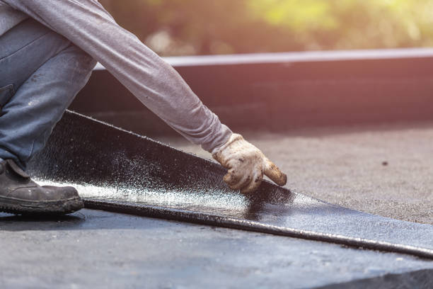 Professional Waterproofing technician working in Millington, MI